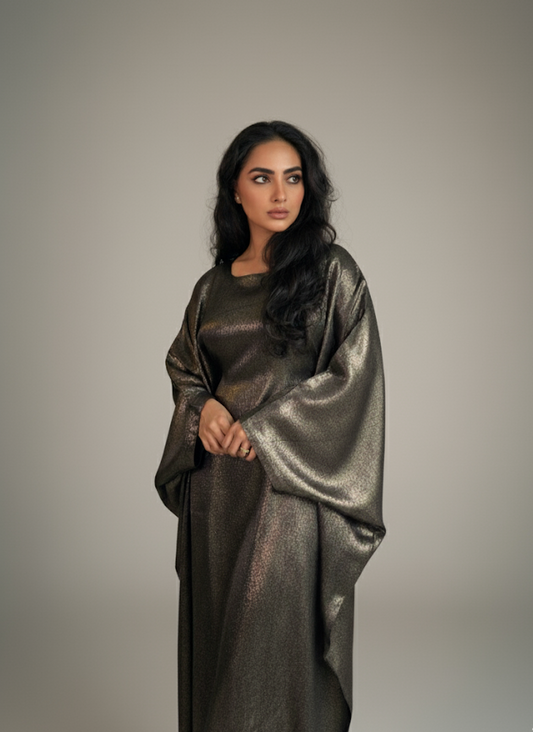A woman wearing metallic abaya 